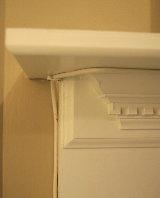 hiding cable on the fireplace